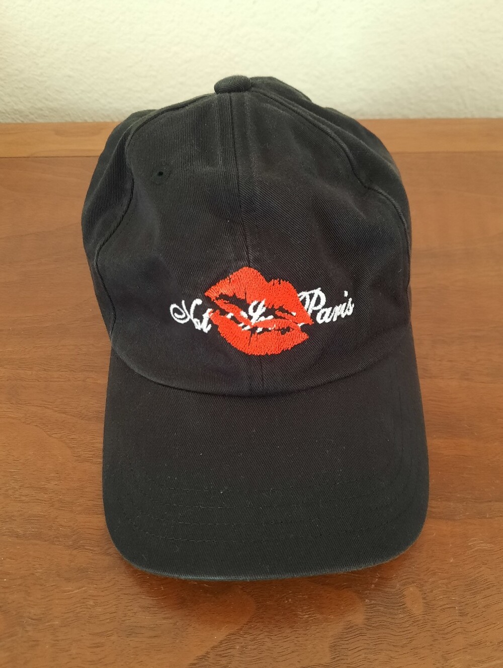 Black 'Not In Paris' Kiss Embroidered Baseball Cap - Women's Accessory